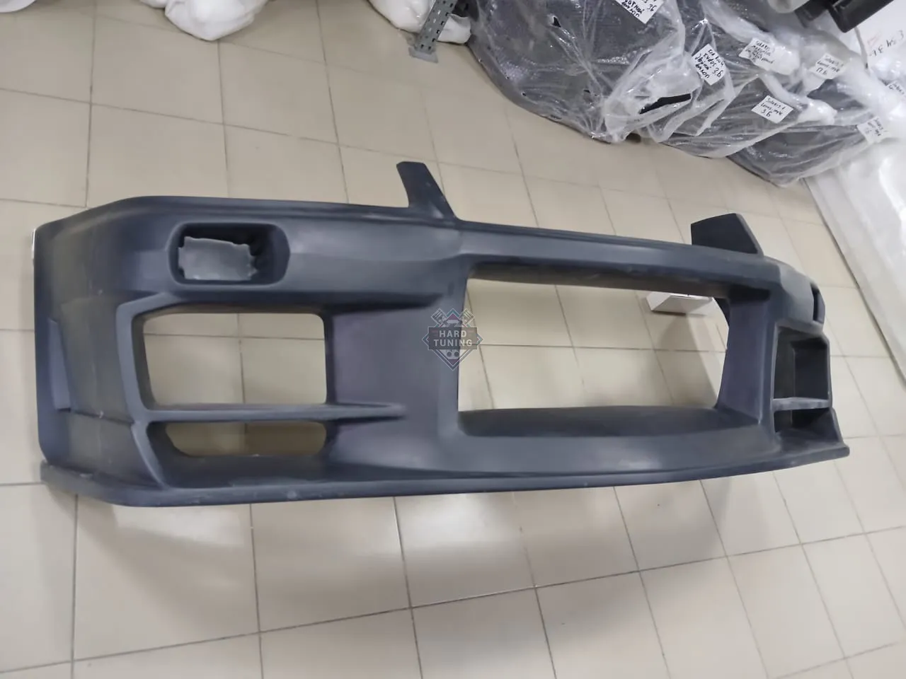 Передний бампер Do-Luck Nissan Skyline R34 GT-R